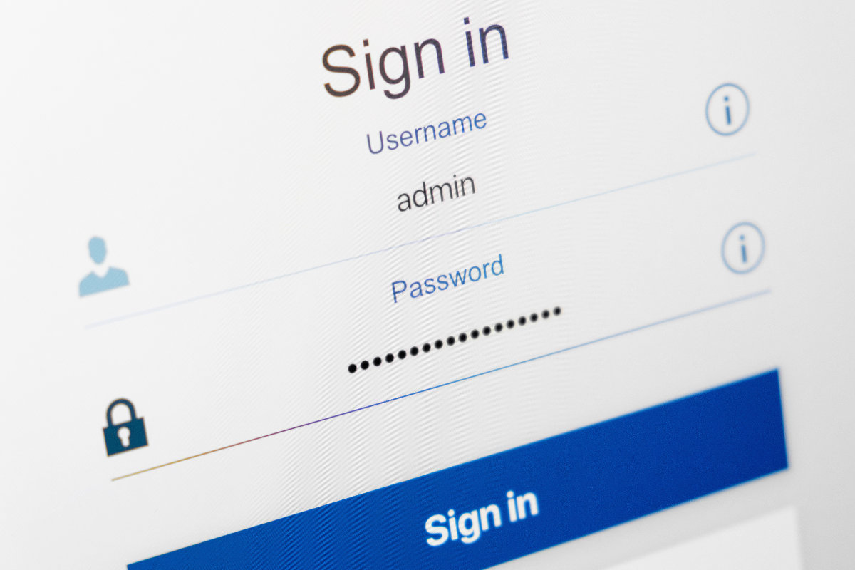 Filled login and hidden by dots password at login screen Login